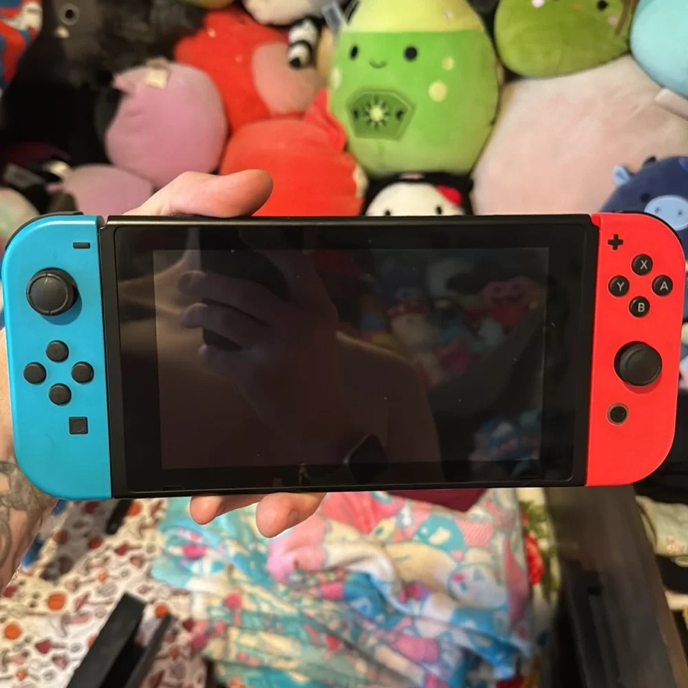 Nintendo switch handheld gaming system like brand new barley ever used